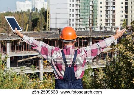 Russian Federation. Belgorod. Builder-installer working. View Large Photo Image Stock Photo - Russian Federation. Belgorod. Builder-installer working.. Fotosearch