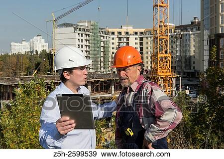 Russian Federation. Belgorod. Engineering and construction-assembling the work. View Large Photo Image Stock Photo - Russian Federation. Belgorod. Engineering and construction-assembling the work.. Fotosearch