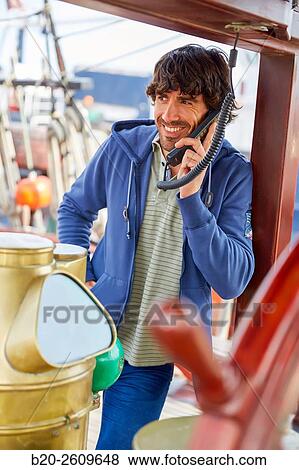 Sailor at the helm of a sailboat, galleon. Basque Country. Spain View Large Photo Image Stock Photo - Sailor at the helm of a sailboat, galleon. Basque Country. Spain. Fotosearch