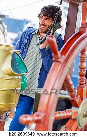 Sailor at the helm of a sailboat, galleon. Basque Country. Spain View Large Photo Image Stock Photo - Sailor at the helm of a sailboat, galleon. Basque Country. Spain. Fotosearch