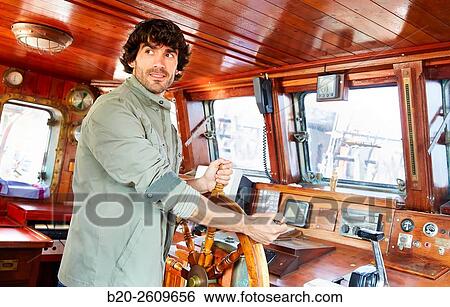 Sailor at the helm of a sailboat, galleon. Basque Country. Spain View Large Photo Image Stock Photograph - Sailor at the helm of a sailboat, galleon. Basque Country. Spain. Fotosearch