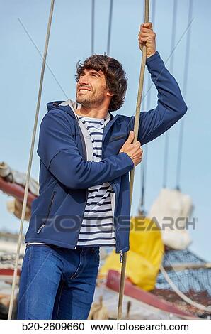 Sailor in a sailboat, galleon. Basque Country. Spain View Large Photo Image Stock Image - Sailor in a sailboat, galleon. Basque Country. Spain. Fotosearch