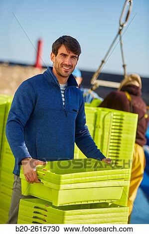 Sailor in the fishing port. Hondarribia. Gipuzkoa. Basque Country. Spain View Large Photo Image Stock Image - Sailor in the fishing port. Hondarribia. Gipuzkoa. Basque Country. Spain. Fotosearch