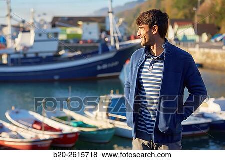 Sailor in the fishing port. Hondarribia. Gipuzkoa. Basque Country. Spain View Large Photo Image Stock Photo - Sailor in the fishing port. Hondarribia. Gipuzkoa. Basque Country. Spain. Fotosearch