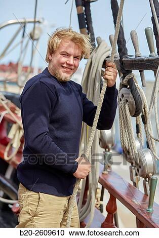 Sailor. Ropes sail of a sailboat, galleon. Basque Country. Spain View Large Photo Image Stock Image - Sailor. Ropes sail of a sailboat, galleon. Basque Country. Spain. Fotosearch