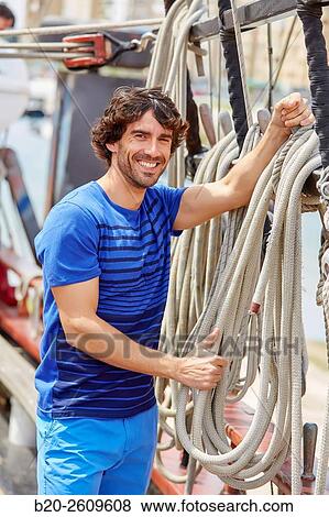 Sailor. Ropes sail of a sailboat, galleon. Basque Country. Spain View Large Photo Image Stock Photo - Sailor. Ropes sail of a sailboat, galleon. Basque Country. Spain. Fotosearch