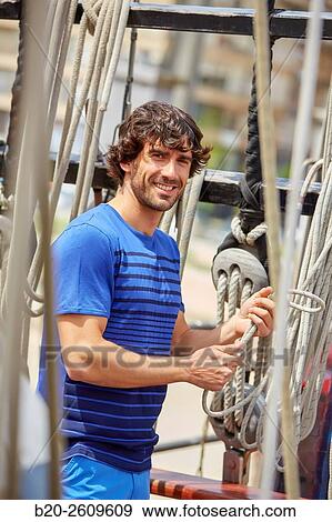 Sailor. Ropes sail of a sailboat, galleon. Basque Country. Spain View Large Photo Image Stock Photo - Sailor. Ropes sail of a sailboat, galleon. Basque Country. Spain. Fotosearch