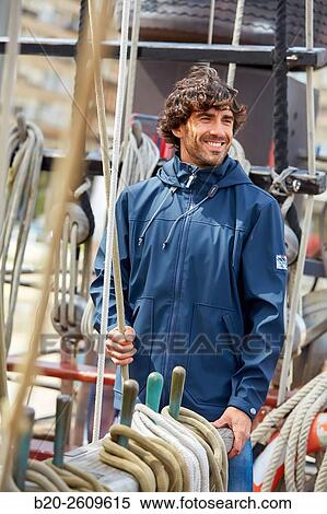 Sailor. Ropes sail of a sailboat, galleon. Basque Country. Spain View Large Photo Image Stock Photography - Sailor. Ropes sail of a sailboat, galleon. Basque Country. Spain. Fotosearch