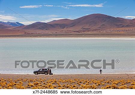 Salar (salt flats) or laguna (lagoon) de Tuyaito, also called Tuyajito, Altiplano, Puna, Atacama desert. Region de Antofagasta. Chile. View Large Photo Image Stock Photography - Salar (salt flats) or laguna (lagoon) de Tuyaito, also called Tuyajito, Altiplano, Puna, Atacama desert. Region de Antofagasta. Chile.. Fotosearch