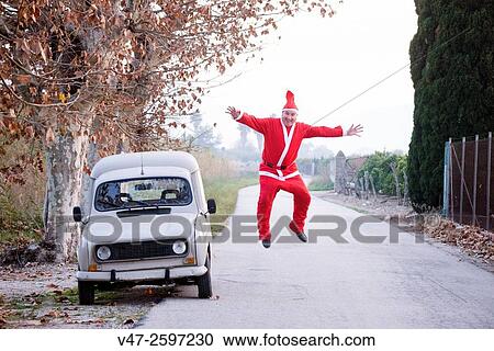 Santa Claus jumping View Large Photo Image Stock Image - Santa Claus jumping. Fotosearch