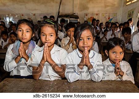 Picture - School children in class in the village of Kampong Tralach on the Tonle Sap River, Kampong Chhnang Province, Cambodia, Khmer.. Fotosearch