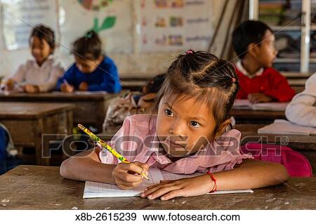 School children in class in the village of Kampong Tralach on the Tonle Sap River, Kampong Chhnang Province, Cambodia, Khmer. View Large Photo Image Stock Photo - School children in class in the village of Kampong Tralach on the Tonle Sap River, Kampong Chhnang Province, Cambodia, Khmer.. Fotosearch