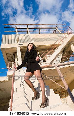 Sexy young woman in industrial environment View Large Photo Image Stock Image - Sexy young woman in industrial environment. Fotosearch