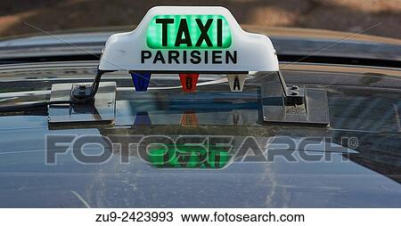 Sign on roof of a Paris taxi with reflection, France, Europe. View Large Photo Image Stock Image - Sign on roof of a Paris taxi with reflection, France, Europe.. Fotosearch