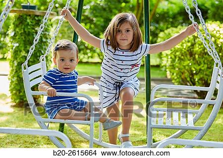 Sisters playing in the park. Girls. Getaria. Gipuzkoa. Basque Country. Spain View Large Photo Image Picture - Sisters playing in the park. Girls. Getaria. Gipuzkoa. Basque Country. Spain. Fotosearch