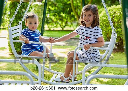 Sisters playing in the park. Girls. Getaria. Gipuzkoa. Basque Country. Spain View Large Photo Image Stock Image - Sisters playing in the park. Girls. Getaria. Gipuzkoa. Basque Country. Spain. Fotosearch