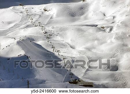 Ski lifts and ski slopes, Saas-Fee, Valais, Switzerland. View Large Photo Image Stock Image - Ski lifts and ski slopes, Saas-Fee, Valais, Switzerland.. Fotosearch