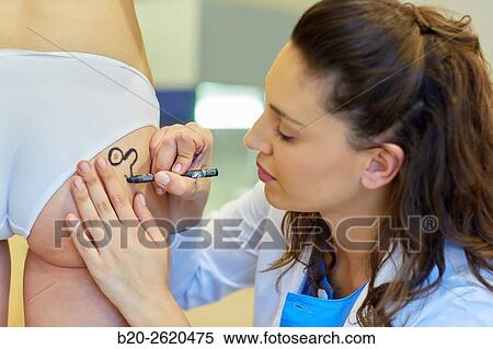 Stock Photography - Skin lesion. Skin flap. Removal of skin lesions often require the performance of a skin flap to prevent deformities affected area. A flap is mobilization surrounding skin or remotely maintaining its vascular supply. There are hundreds of flaps, your choic. Fotosearch