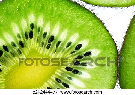 Slices of kiwifruit. View Large Photo Image Stock Photo - Slices of kiwifruit.. Fotosearch