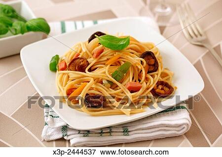 Spaghetti with turkey meat and Chinese mushrooms.. View Large Photo Image Stock Photo - Spaghetti with turkey meat and Chinese mushrooms... Fotosearch