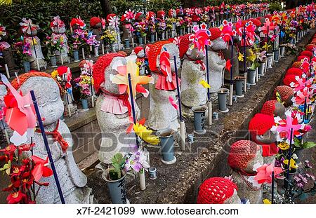 Statues of Jizo dedicated to dead unborn children, in Zojoji temple, Tokyo, Japan. View Large Photo Image Stock Photo - Statues of Jizo dedicated to dead unborn children, in Zojoji temple, Tokyo, Japan.. Fotosearch