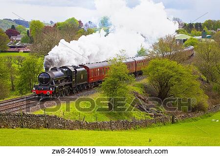 Steam train. LMS Jubilee Class? Leander?. Lazonby, Settle to Carlisle Railway Line, Eden Valley, Cumbria, England, UK. View Large Photo Image Stock Photo - Steam train. LMS Jubilee Class? Leander?. Lazonby, Settle to Carlisle Railway Line, Eden Valley, Cumbria, England, UK.. Fotosearch