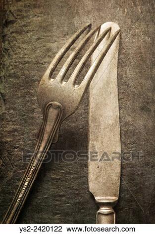 Still life with silverware on table. Knife and fork on a stone background. View Large Photo Image Stock Image - Still life with silverware on table. Knife and fork on a stone background.. Fotosearch