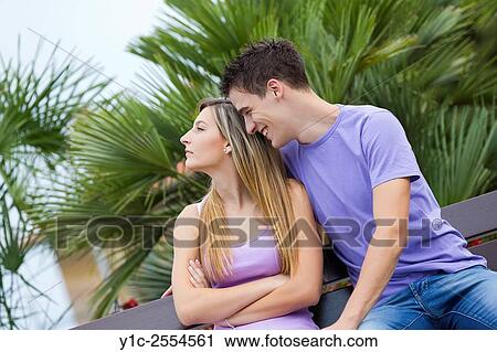 Stock Photo - Teen couple girl and boy acting indifference View Large Photo Image Stock Image - Stock Photo - Teen couple girl and boy acting indifference. Fotosearch