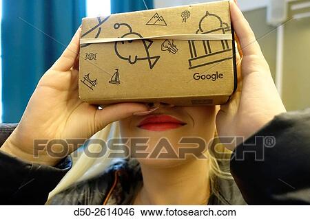 STOCKHOLM, SWEDEN Class 8A at the Blommenbergsskolan school in Grndal gets a hands on demonstration of Google Glasses, a 3 D Virtual Reality (VR) headset made of cardboard and 3D glasses to view special photos on a mobile phone. The cardboard box is slott View Large Photo Image Stock Photograph - STOCKHOLM, SWEDEN Class 8A at the Blommenbergsskolan school in Grndal gets a hands on demonstration of Google Glasses, a 3 D Virtual Reality (VR) headset made of cardboard and 3D glasses to view special photos on a mobile phone. The cardboard box is slott. Fotosearch