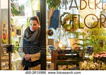 STOCKHOLM, SWEDEN Local flower shop owner. View Large Photo Image Stock Photograph - STOCKHOLM, SWEDEN Local flower shop owner.. Fotosearch