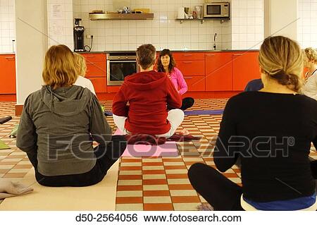 STOCKHOLM SWEDEN Yoga instructor. Yoga class. View Large Photo Image Stock Photograph - STOCKHOLM SWEDEN Yoga instructor. Yoga class.. Fotosearch