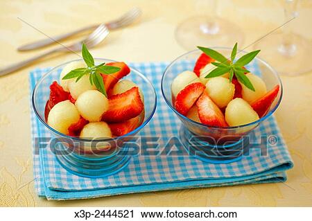 Strawberries and melon with light infusion. View Large Photo Image Stock Image - Strawberries and melon with light infusion.. Fotosearch