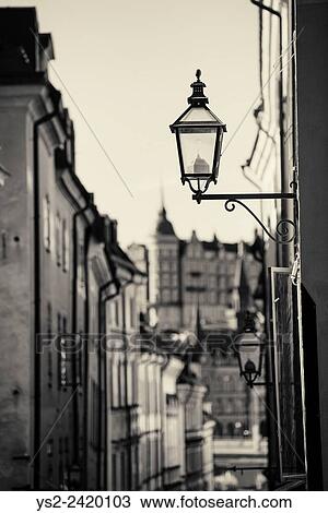 Street lamp on old building in Gamla Stan (Old Town) Stockholm, Sweden. View Large Photo Image Stock Image - Street lamp on old building in Gamla Stan (Old Town) Stockholm, Sweden.. Fotosearch