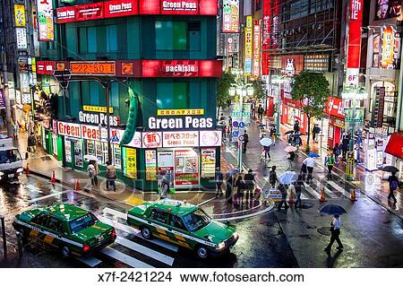 Street scene in east exit of Shinjuku JR station, Shinjuku, Tokyo. View Large Photo Image Picture - Street scene in east exit of Shinjuku JR station, Shinjuku, Tokyo.. Fotosearch