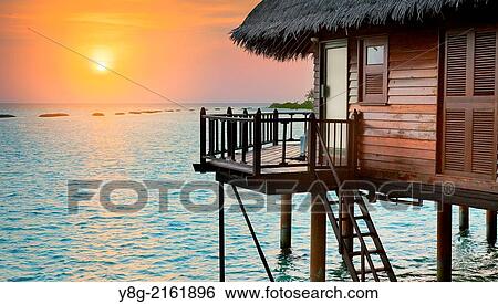 Sunset at Maldives, Ari Atol, Indian Ocean. View Large Photo Image Stock Photograph - Sunset at Maldives, Ari Atol, Indian Ocean.. Fotosearch
