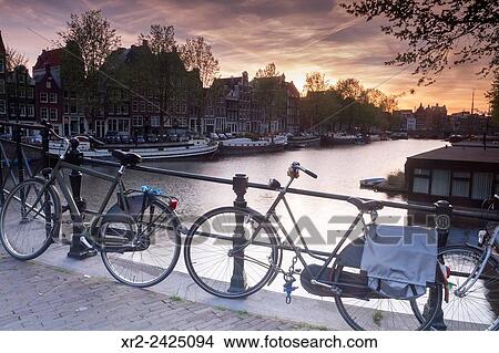 Sunset in Oude Waal, Amsterdam, Holland. View Large Photo Image Picture - Sunset in Oude Waal, Amsterdam, Holland.. Fotosearch