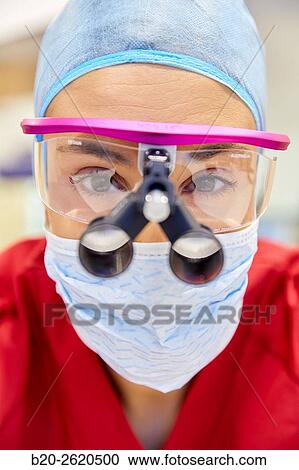 Surgeon with magnifying glasses. Surgical glasses. Plastic surgery. View Large Photo Image Stock Image - Surgeon with magnifying glasses. Surgical glasses. Plastic surgery.. Fotosearch