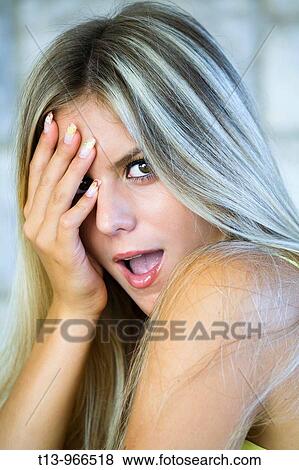 Surprised young woman portrait View Large Photo Image Stock Photo - Surprised young woman portrait. Fotosearch