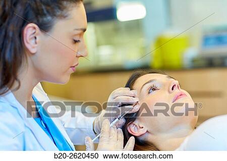 Syringe. Botox, cosmetic medicine. Botulinum toxin treatment involves injecting the toxin into specific parts of the muscles responsible for facial expression, getting that muscle paralysis and thus the disappearance of the wrinkle or crease occurs in mus View Large Photo Image Stock Image - Syringe. Botox, cosmetic medicine. Botulinum toxin treatment involves injecting the toxin into specific parts of the muscles responsible for facial expression, getting that muscle paralysis and thus the disappearance of the wrinkle or crease occurs in mus. Fotosearch