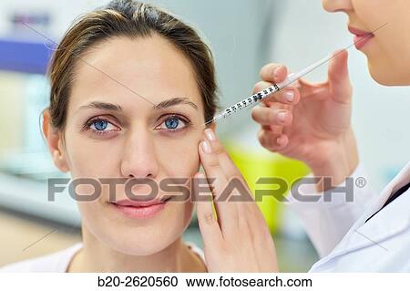 Syringe. Botox, cosmetic medicine. Botulinum toxin treatment involves injecting the toxin into specific parts of the muscles responsible for facial expression, getting that muscle paralysis and thus the disappearance of the wrinkle or crease occurs in mus View Large Photo Image Stock Image - Syringe. Botox, cosmetic medicine. Botulinum toxin treatment involves injecting the toxin into specific parts of the muscles responsible for facial expression, getting that muscle paralysis and thus the disappearance of the wrinkle or crease occurs in mus. Fotosearch