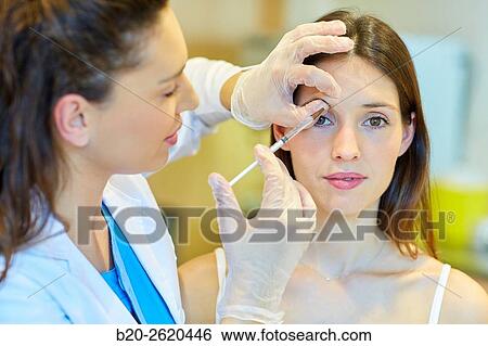 Syringe. Botox, cosmetic medicine. Botulinum toxin treatment involves injecting the toxin into specific parts of the muscles responsible for facial expression, getting that muscle paralysis and thus the disappearance of the wrinkle or crease occurs in mus View Large Photo Image Stock Photograph - Syringe. Botox, cosmetic medicine. Botulinum toxin treatment involves injecting the toxin into specific parts of the muscles responsible for facial expression, getting that muscle paralysis and thus the disappearance of the wrinkle or crease occurs in mus. Fotosearch