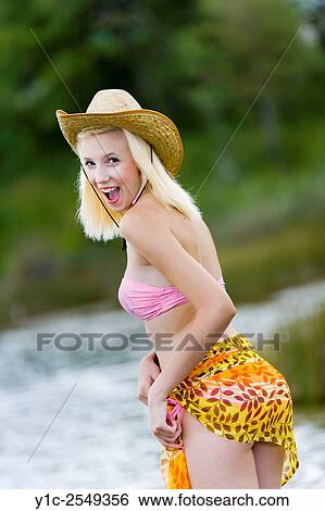 Teen girl blonde looking back View Large Photo Image Stock Photograph - Teen girl blonde looking back. Fotosearch