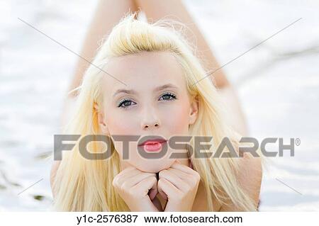 Stock Photo - Teen girl high-key outdoor portrait. Fotosearch
