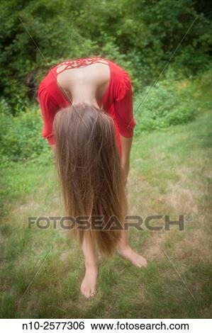 Stock Photograph - Teenage girl outdoors.. Fotosearch
