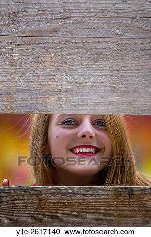 Stock Image - Teenager girl headshot smiling. Fotosearch
