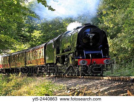 The Duchess Of Sutherland speeds through Trimpley on the Severn Valley Railway, Worcestershire, England, Europe. View Large Photo Image Stock Image - The Duchess Of Sutherland speeds through Trimpley on the Severn Valley Railway, Worcestershire, England, Europe.. Fotosearch