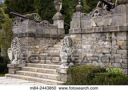 The heraldic lion marble sculptures in front of the Peles Castle in autumn, Sinaia, Romania, Eastern Europe. View Large Photo Image Stock Image - The heraldic lion marble sculptures in front of the Peles Castle in autumn, Sinaia, Romania, Eastern Europe.. Fotosearch