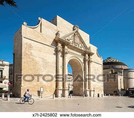 The Porta Napoli (1548) on the junction of Via Palmieri and Via Adua in Lecce, Puglia, Italy. View Large Photo Image Stock Image - The Porta Napoli (1548) on the junction of Via Palmieri and Via Adua in Lecce, Puglia, Italy.. Fotosearch