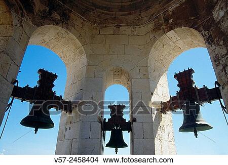 Three bells in the bell tower of the cathedral. Cadiz, Spain. View Large Photo Image Picture - Three bells in the bell tower of the cathedral. Cadiz, Spain.. Fotosearch