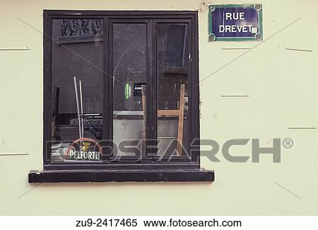 Through the window of a closed bar in Rue Drevet, Montmartre, Paris, France, Europe. View Large Photo Image Stock Photography - Through the window of a closed bar in Rue Drevet, Montmartre, Paris, France, Europe.. Fotosearch